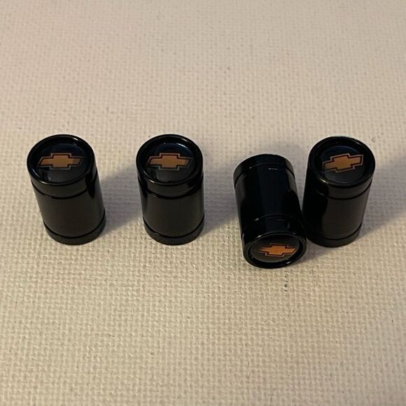 Chevrolet valve Stem caps in black set of 4 with Logo NWT - Picture 2 of 5